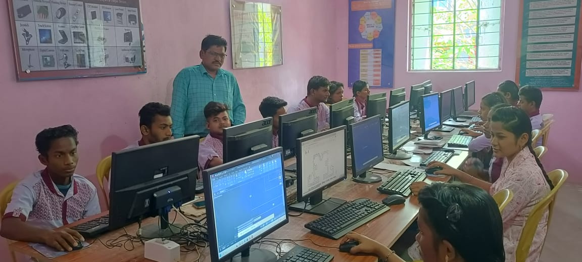 Students learning computer skills