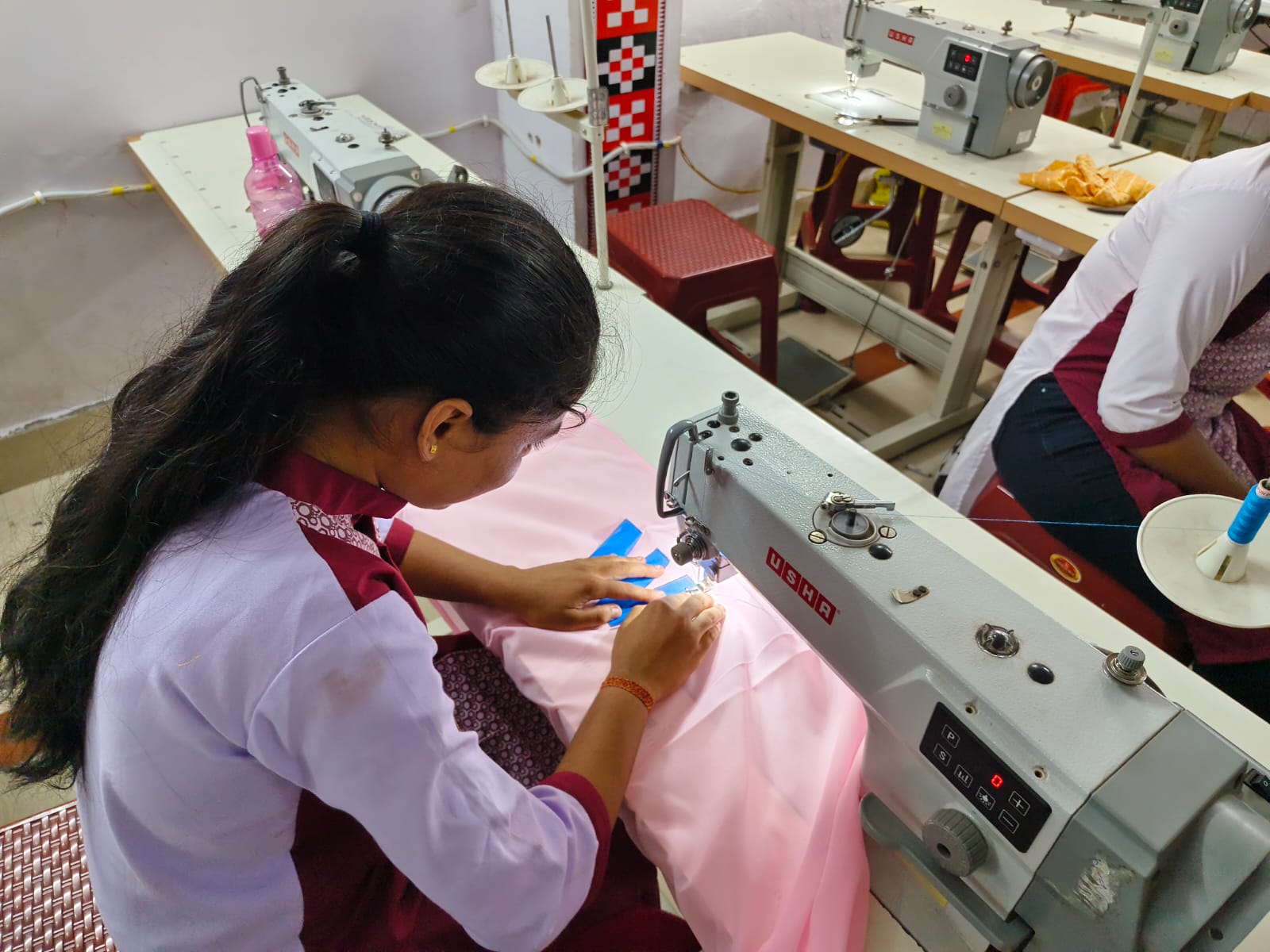 Student practising sewing skills